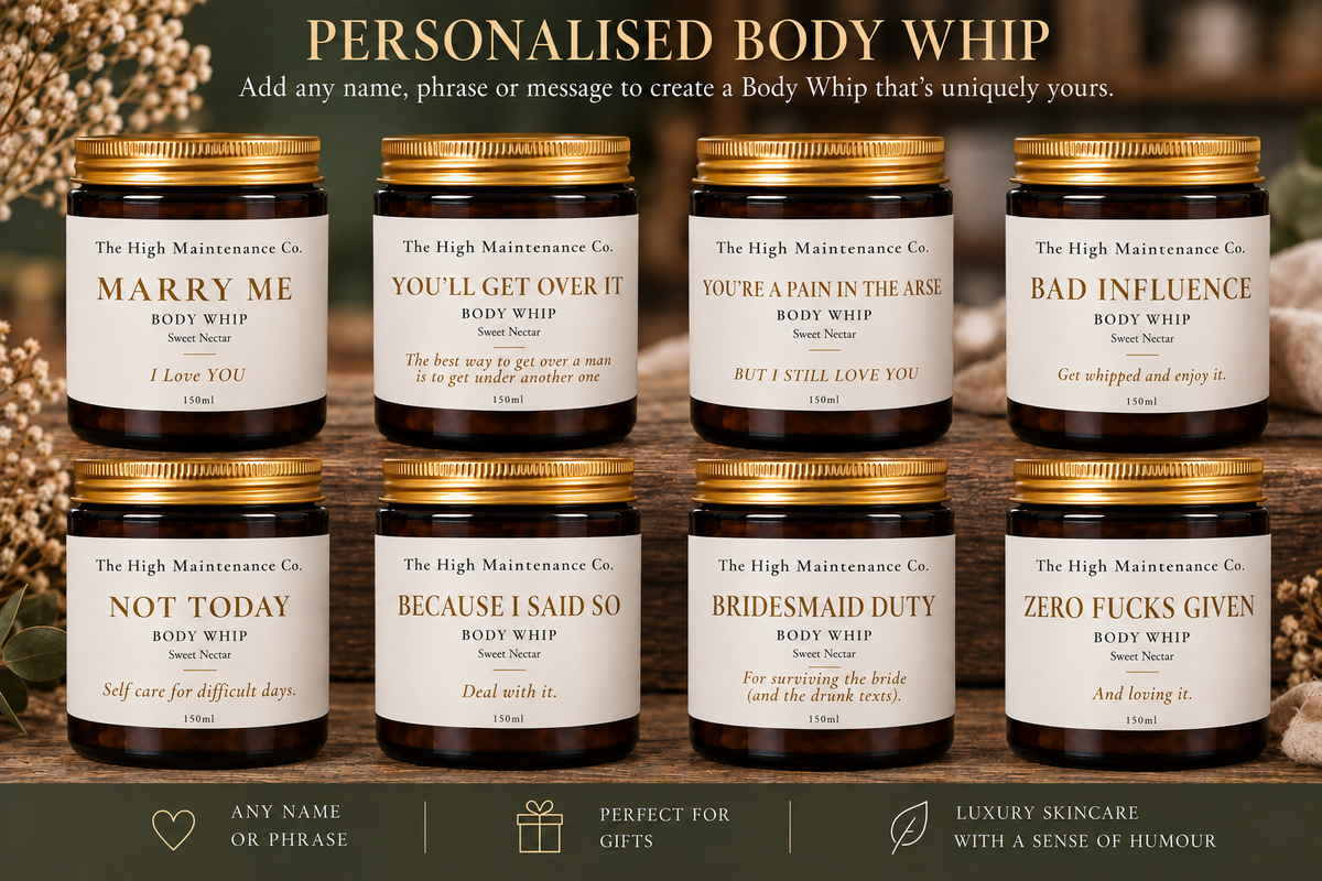 Eight jars of personalized body whip arranged in two rows on a dark wooden surface with a blurred floral background. The top of the image has the text 'PERSONALISED BODY WHIP' and a subtitle about creating a body whip that is uniquely yours.